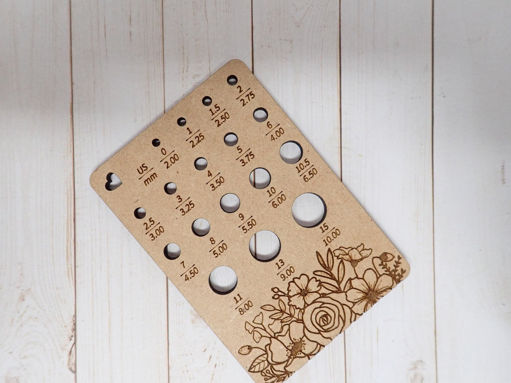Floral needle gauge for knitting needles